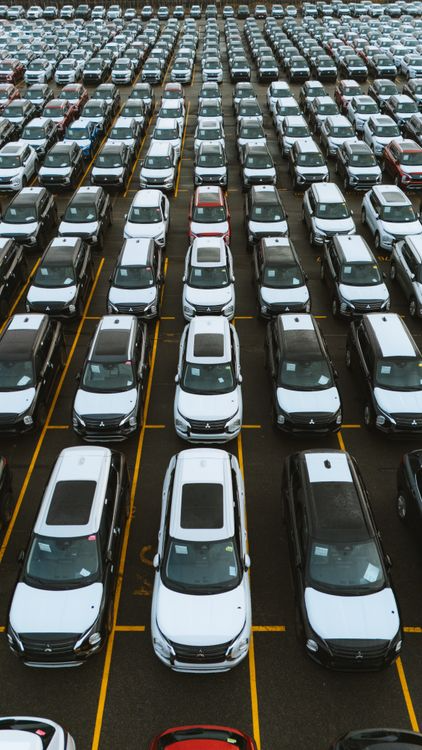 Aerial view of fleet vehicles parked in commercial lot