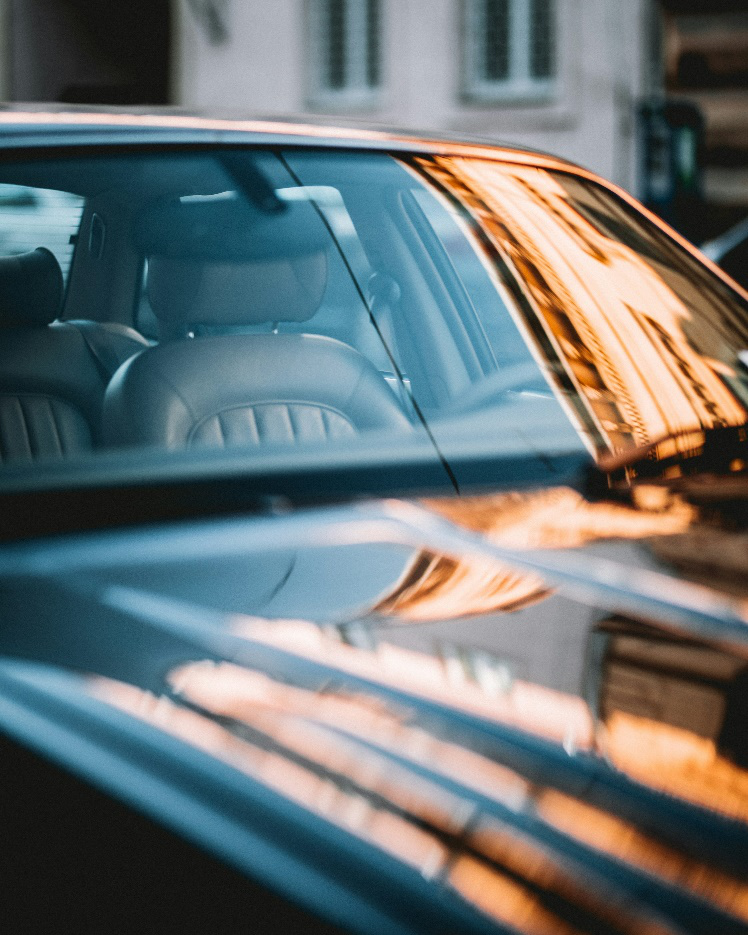 Clear vehicle windshield providing unobstructed road visibility during daytime