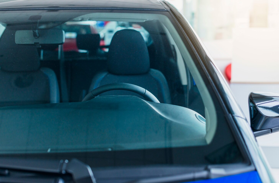 New windshield providing clear visibility from vehicle interior Image Caption: A fresh windshield enhances driving confidence
