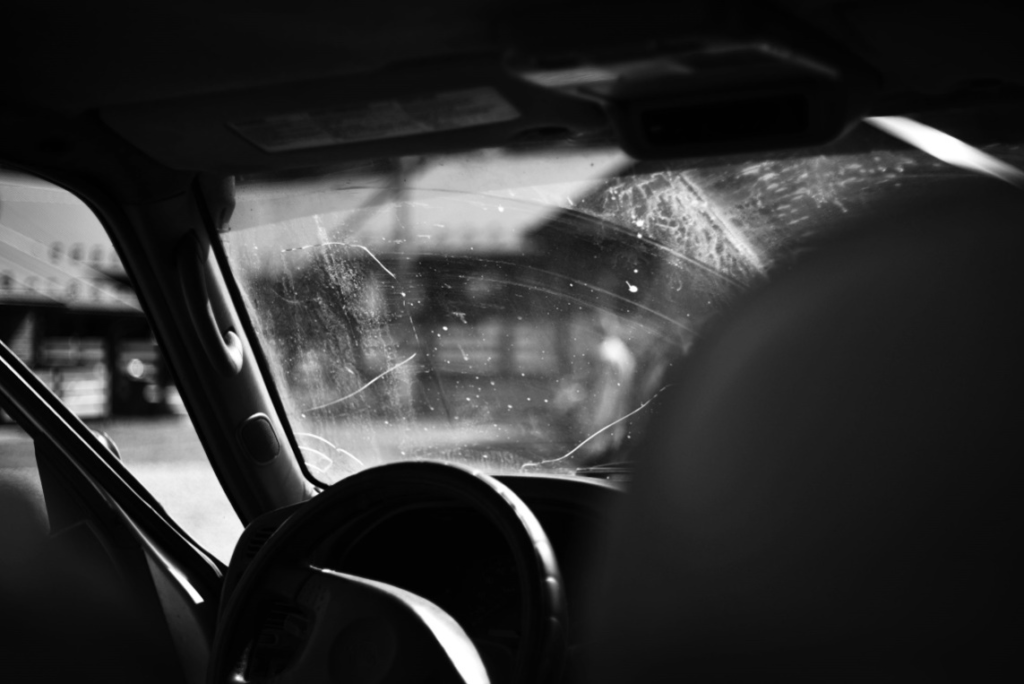 Vehicle windshield with multiple cracks affecting driver visibility